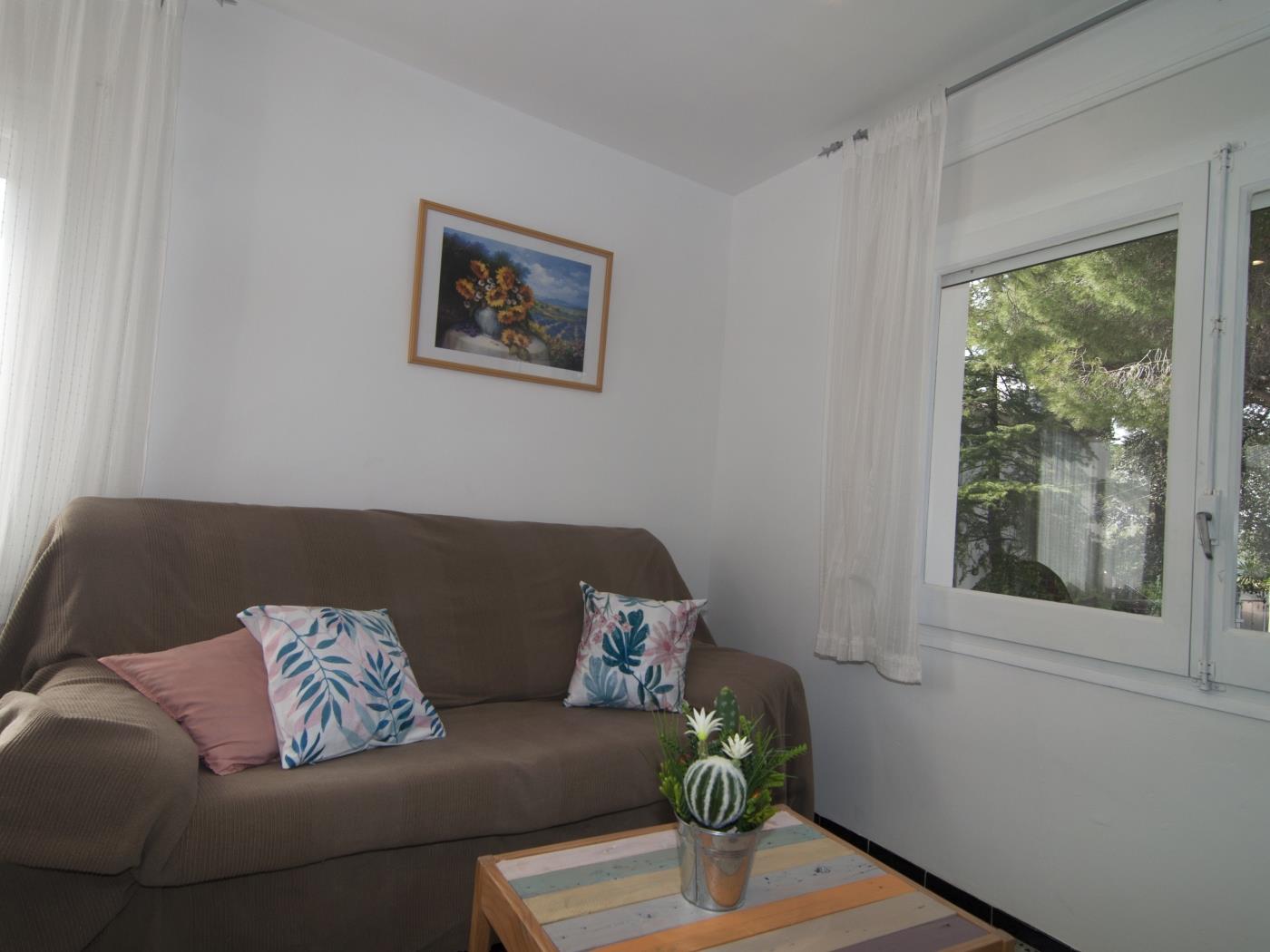 Confortable appartement avec grand jardin et barbecue à l'Escala