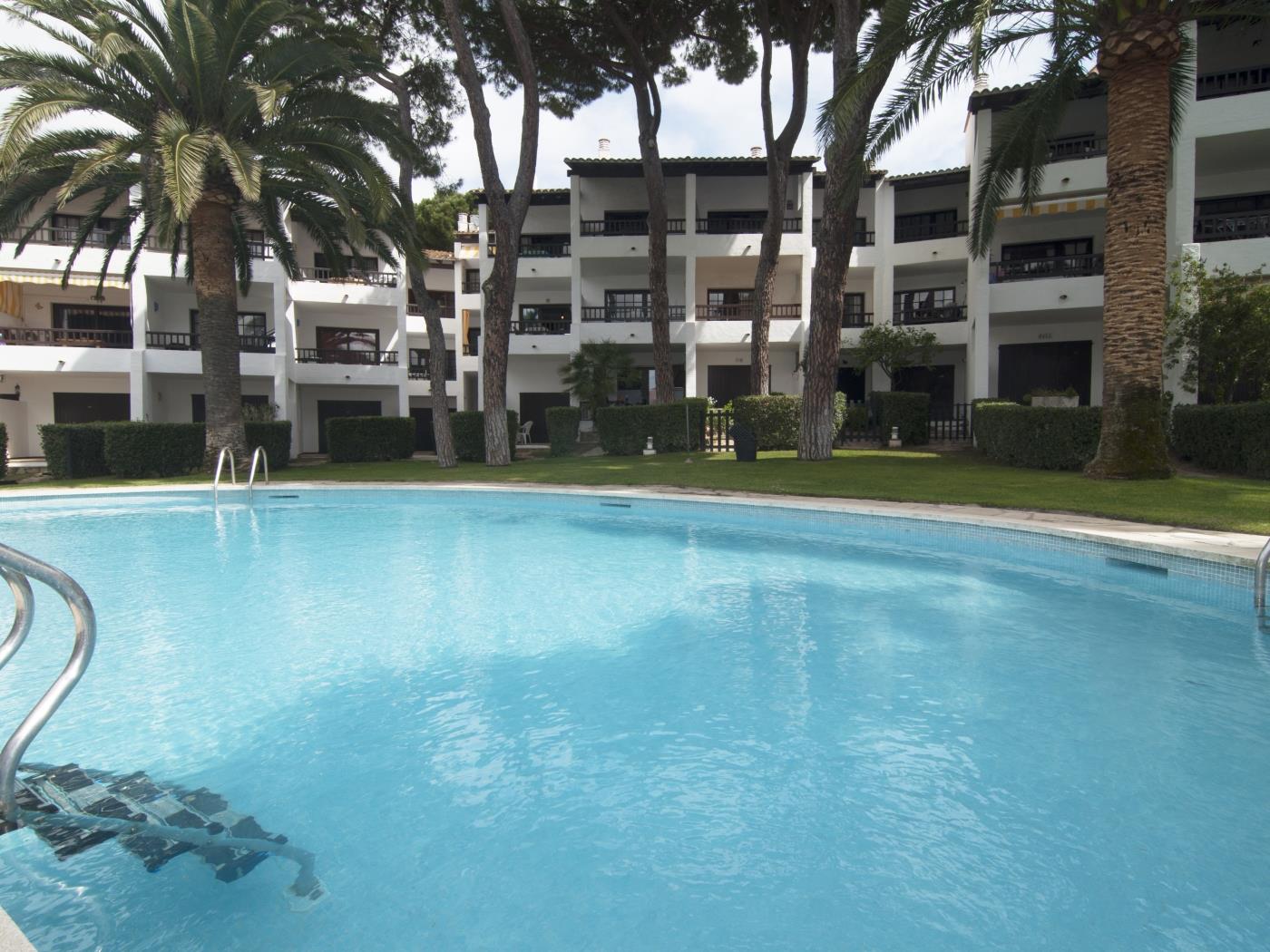 Acogedor apartamento con piscina comunitaria en la zona del puerto en l'Escala