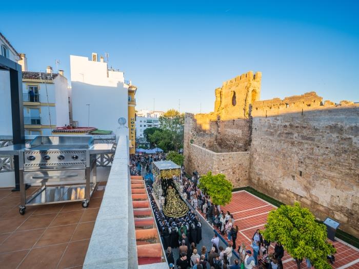 BBQ area on solarium with impressive views over the Medieval Castle of Marbella