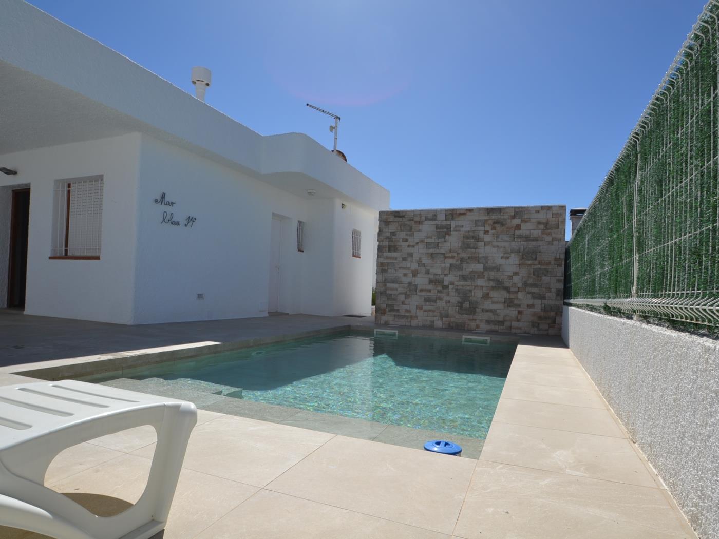 Casa Blanca amb piscina privada en Riumar, Costa Dorada a RIUMAR-DELTEBRE